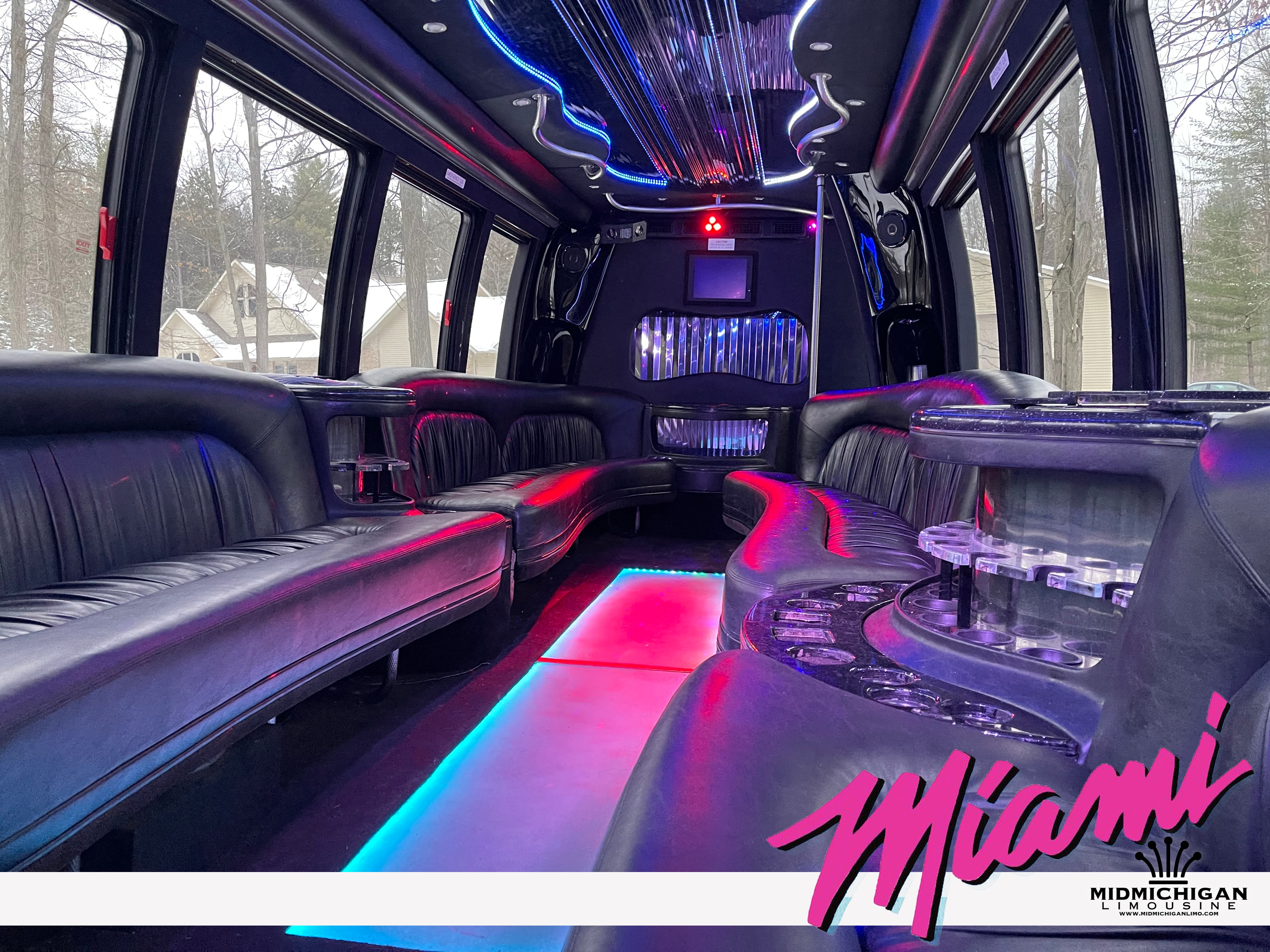 Miami Limo Bus interior — neon blue lighting