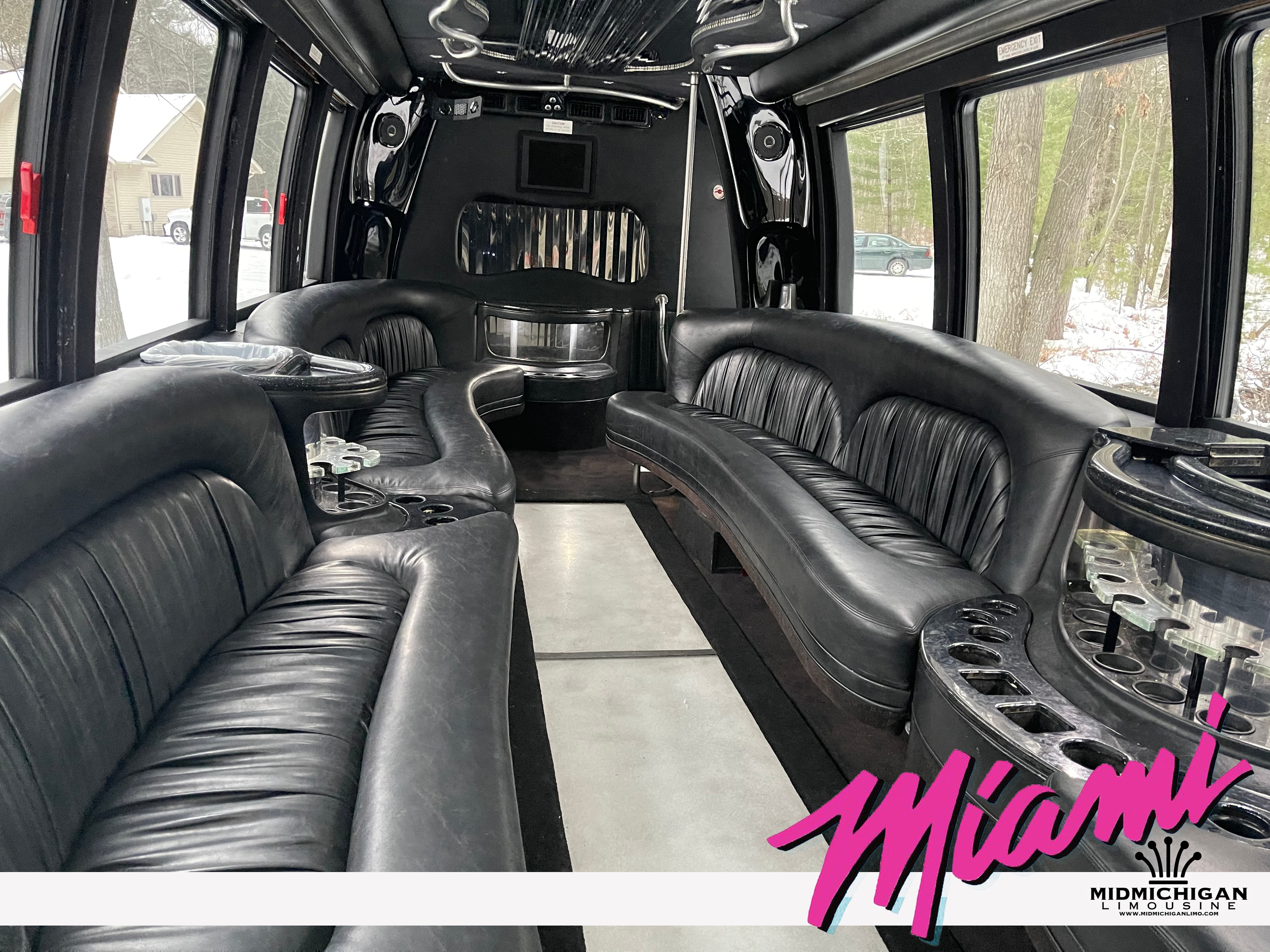 Miami Limo Bus interior — red neon dance floor