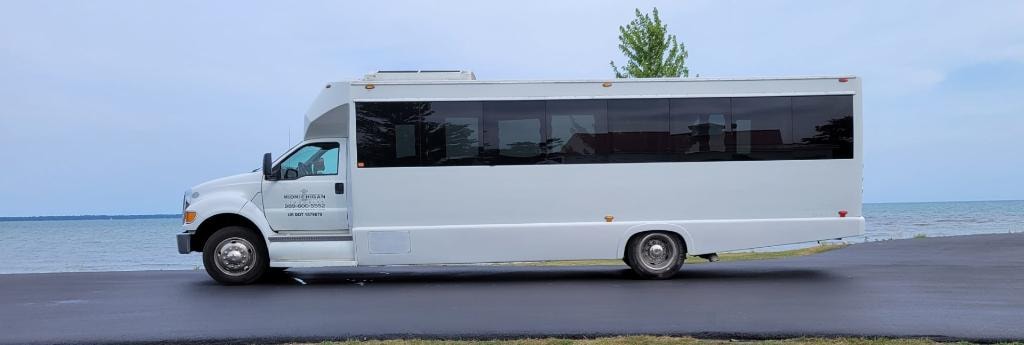 New Orleans Limo Bus exterior — lakeside view